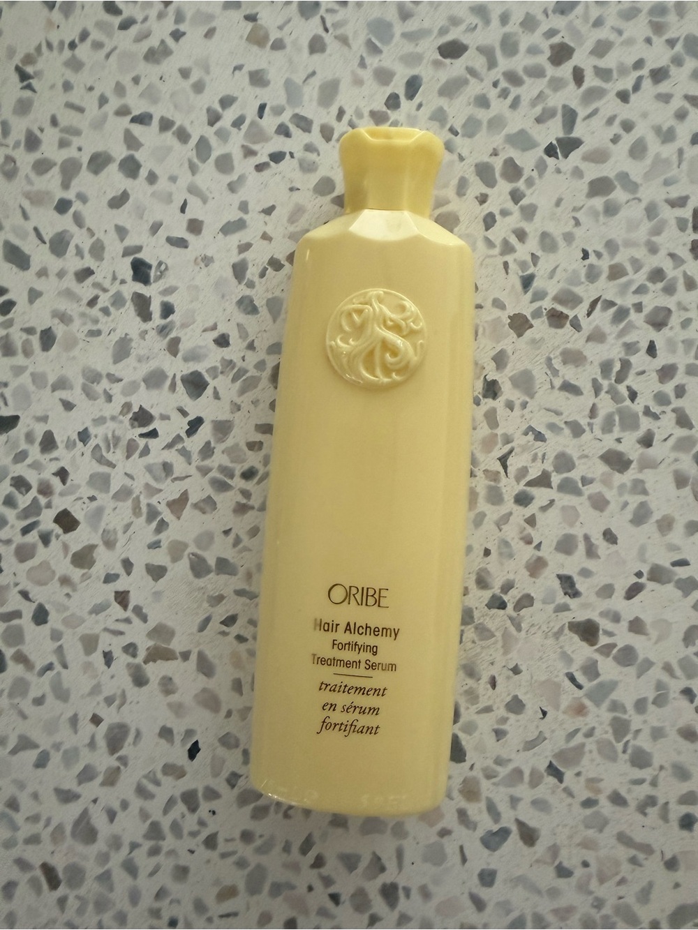 Oribe Hair Alchemy Fortifying Treatment Serum - Pale Yellow Bottle